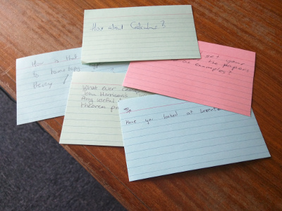 Coloured Index cards with the questions below written on them